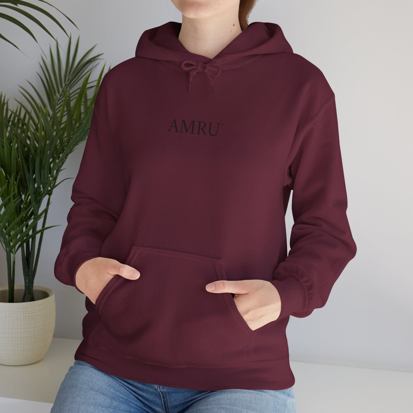 AMRU Minimal Front Logo Hoodie with Surreal Cityscape Back Graphic